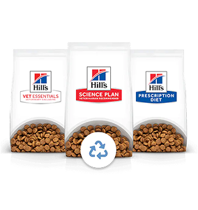 Envase de alimento para mascotas de Hill's con cartel de reciclaje